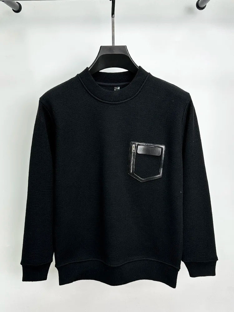 Suéter con costuras de cuero