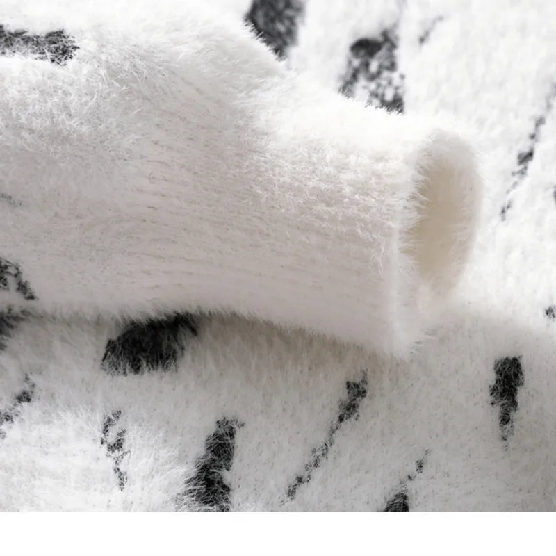 Suéter de punto suelto