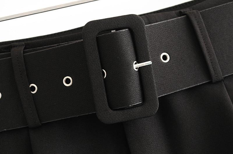 Pantalones de traje de señora de oficina con cinturón